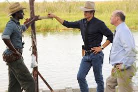 U.S. Marshall Raylan Givens (Timothy Olyphant) questions criminal advisor Jean Baptiste (Edi Gathegi) in the Series Five debut of 'Justified.'